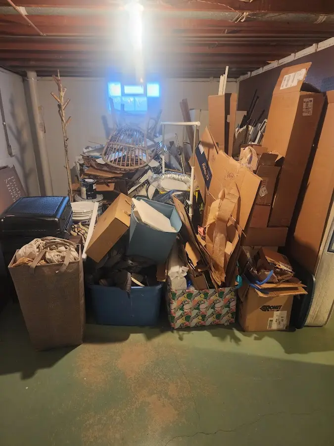 Roll-off dumpster container at job site for Construction Dumpster Rental in Sterling